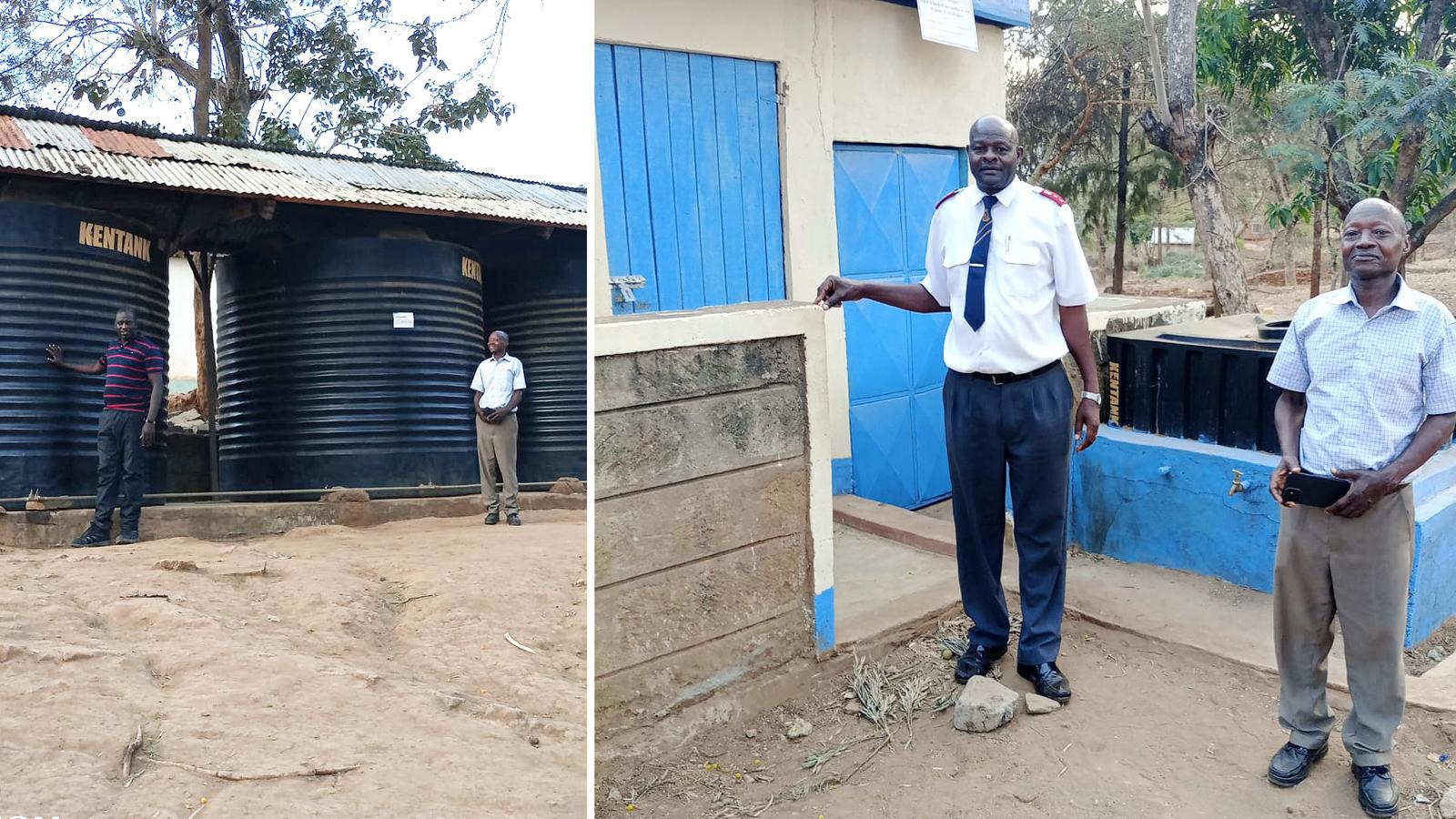 Vattentankar vid en skola i Kenya - två män varav en i Frälsningsarméns uniform står framför ett hus med blå dörrar där det finns toaletter. 